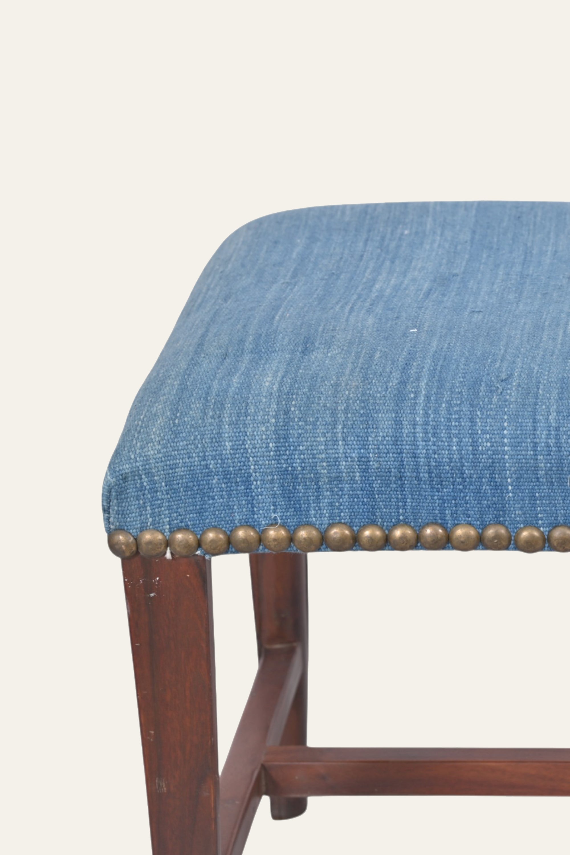 Blue Upholstered Wooden Ottoman with Brass Nailhead Trim