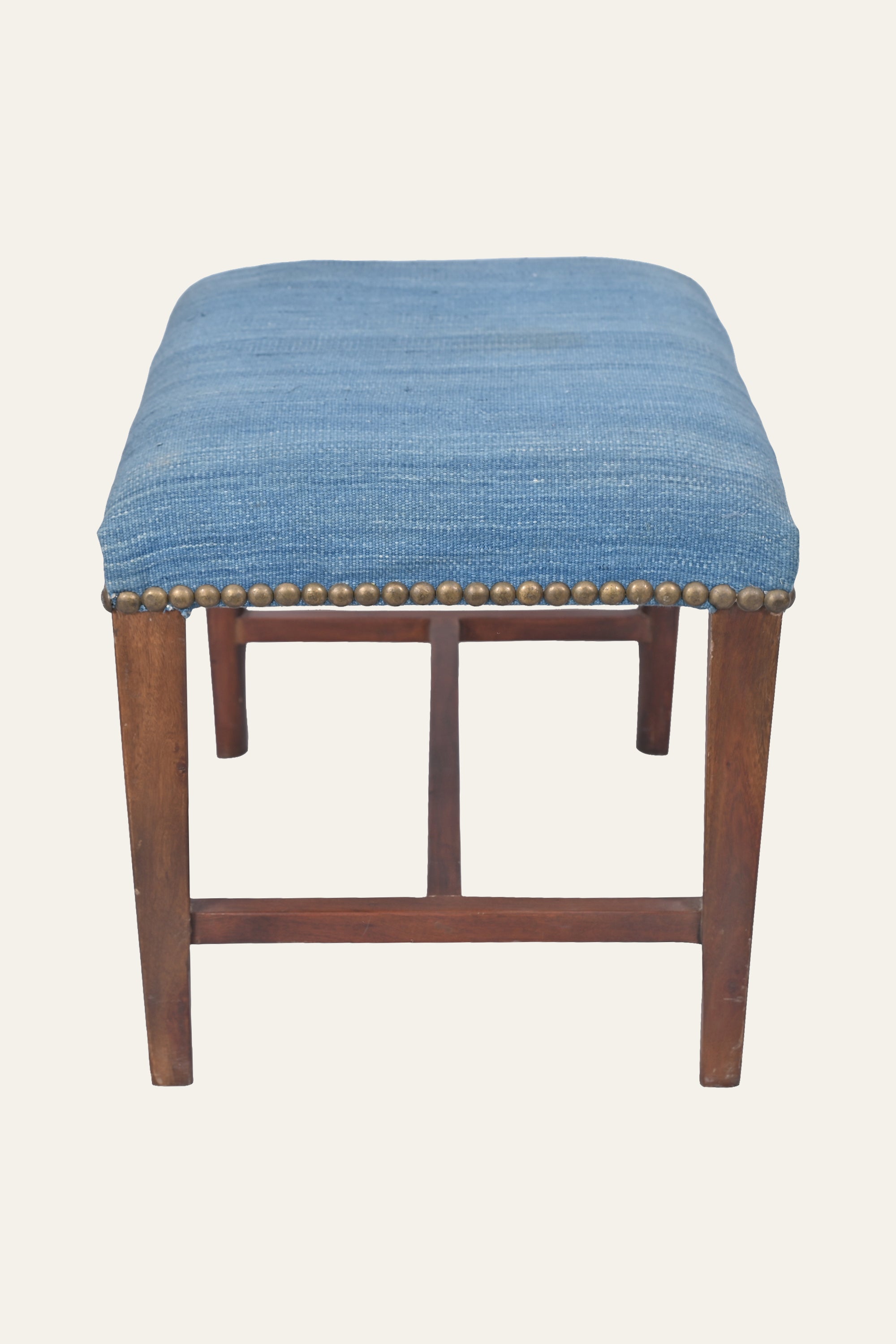 Blue Upholstered Wooden Ottoman with Brass Nailhead Trim