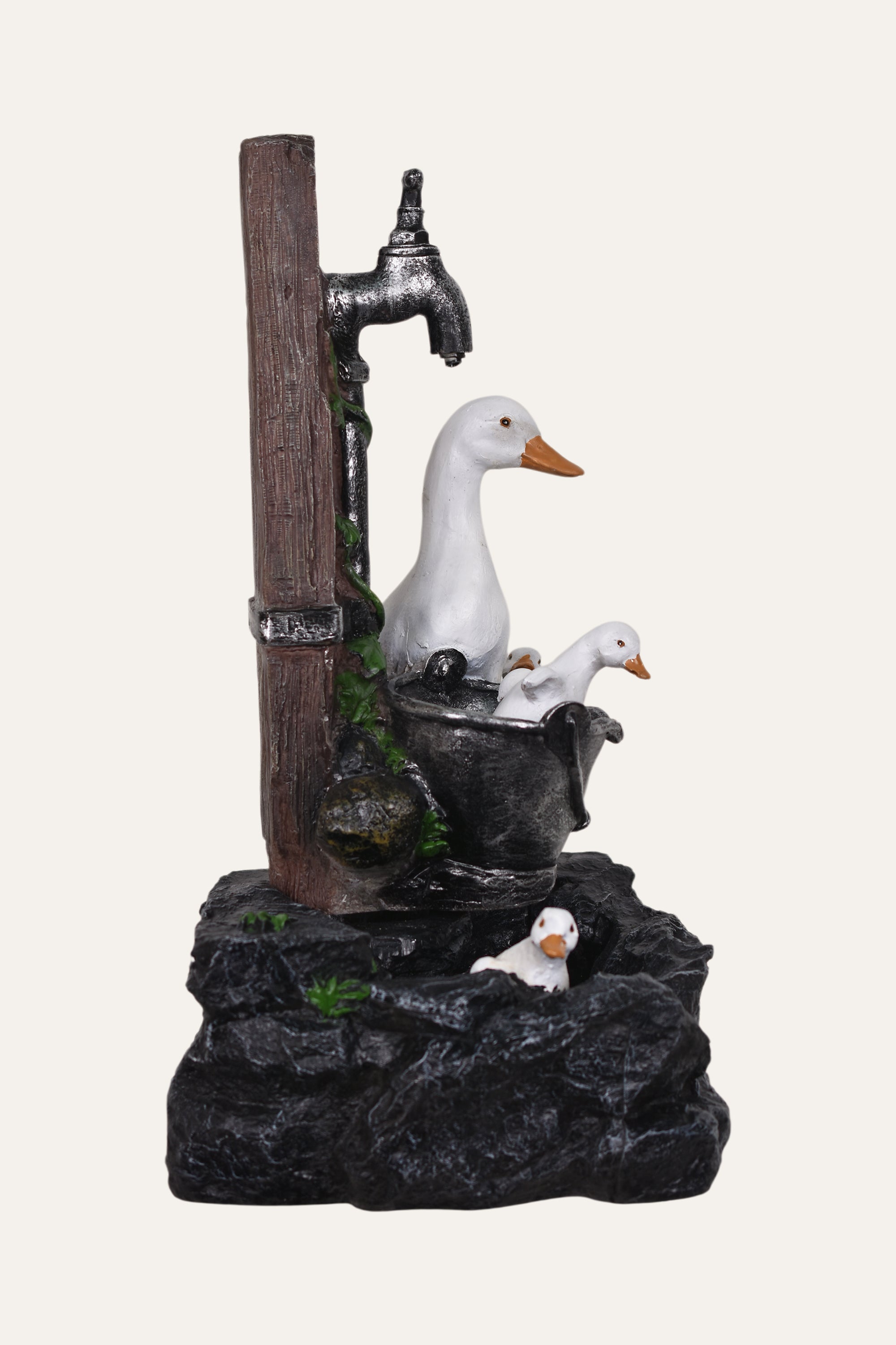 Decorative fountain with ducks family