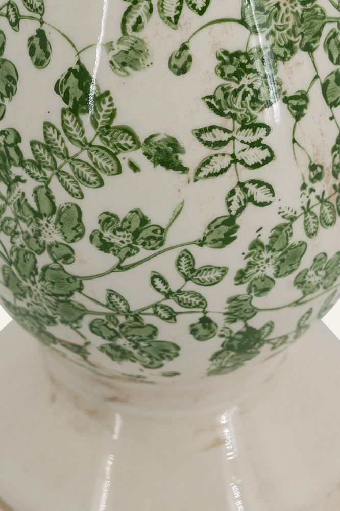 Ceramic vase with green floral pattern 