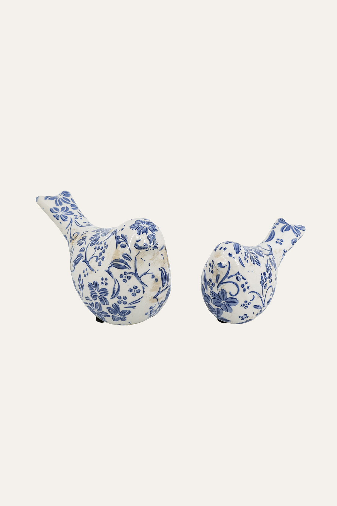 Decorative bird figurine with floral pattern