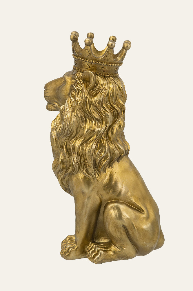 Gold lion statue with a crown 