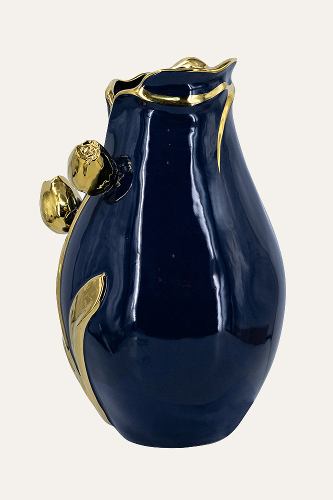 Navy blue vase with gold accents
