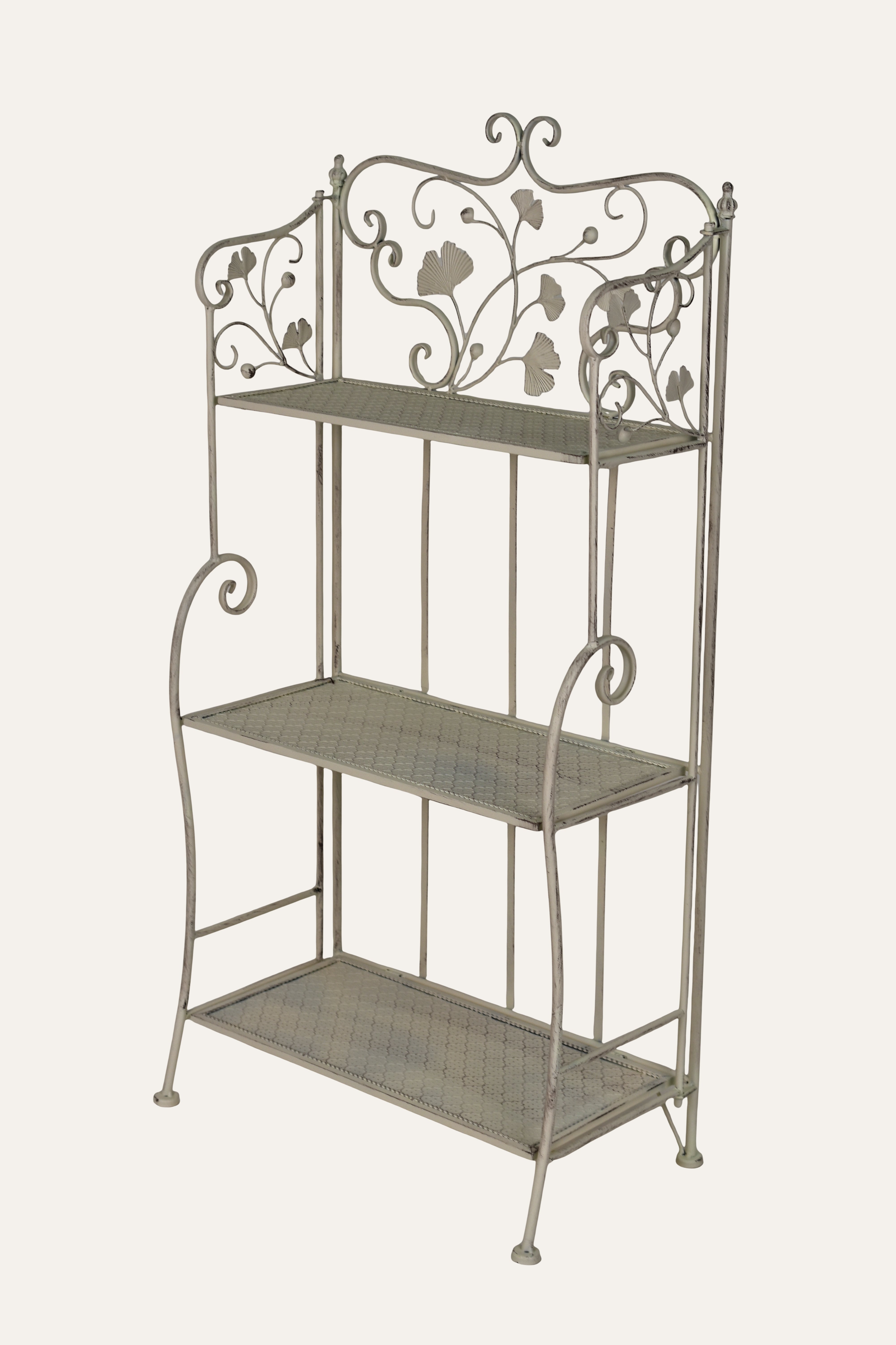 Decorative metal shelf with floral patterns
