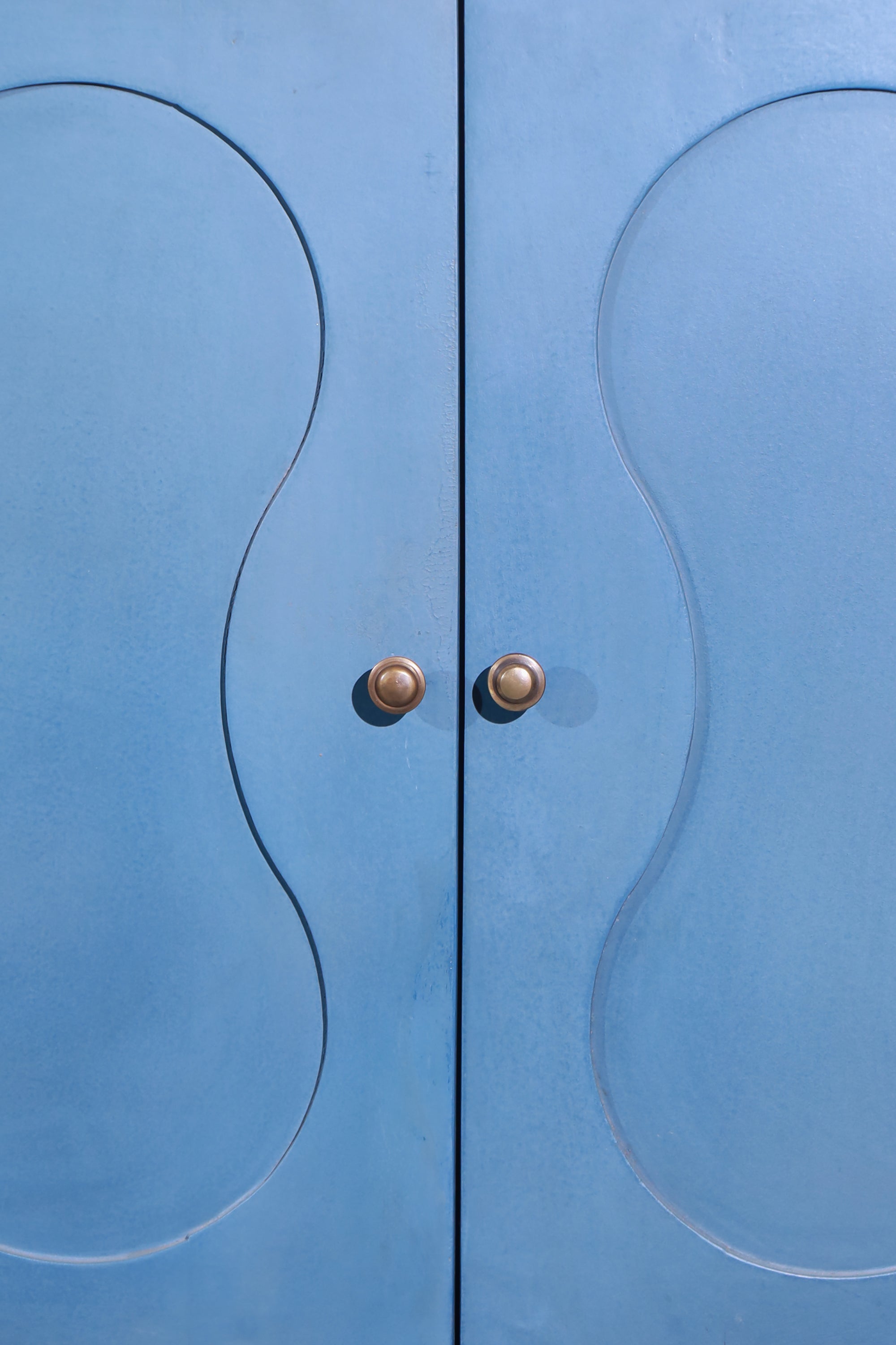 Blue Two-Door Cabinet for Dining Room Storage