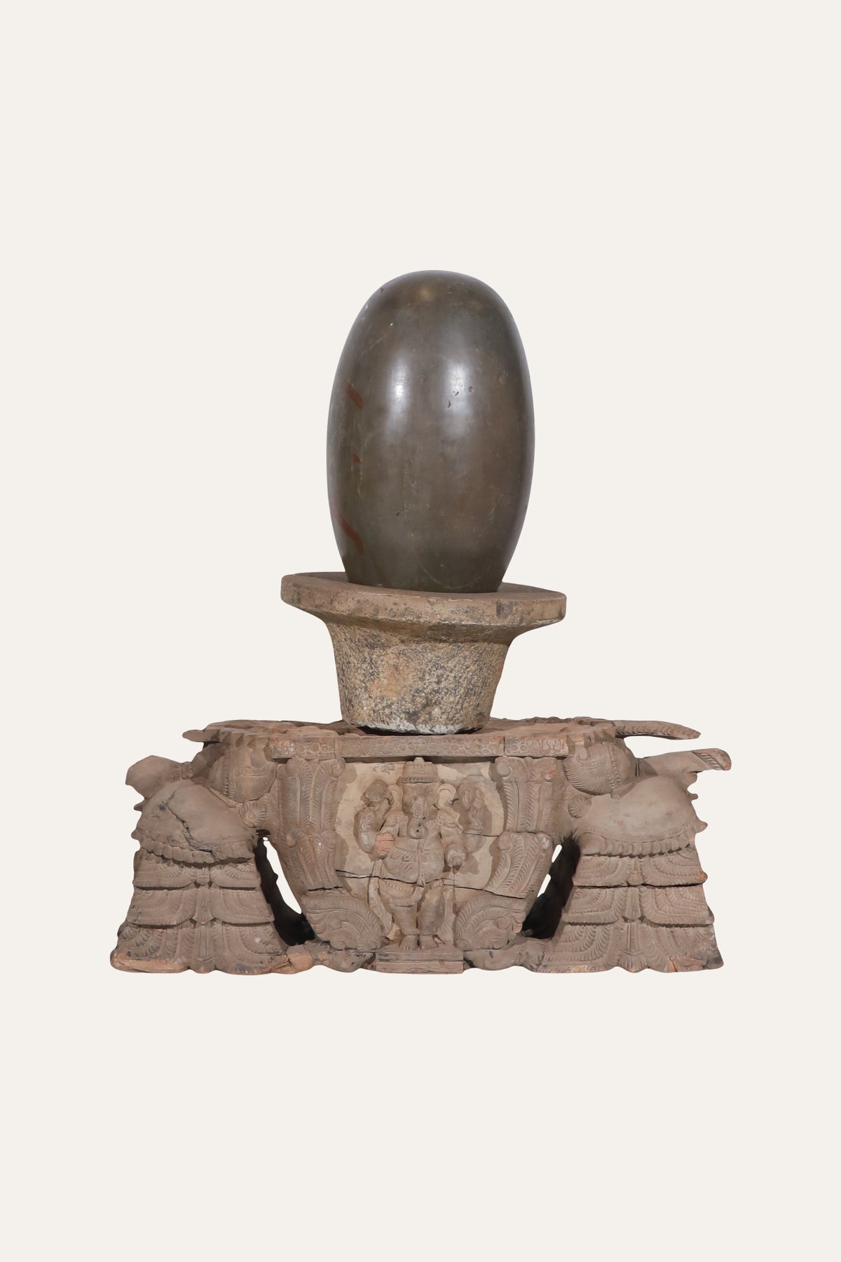 Shiva Lingam on Ornately Carved Panel