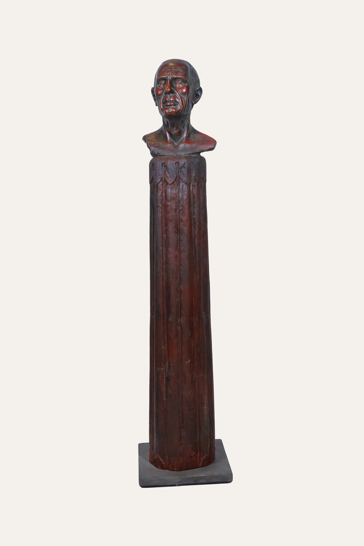 Carved Male Portrait Bust on Tall Faceted Pedestal