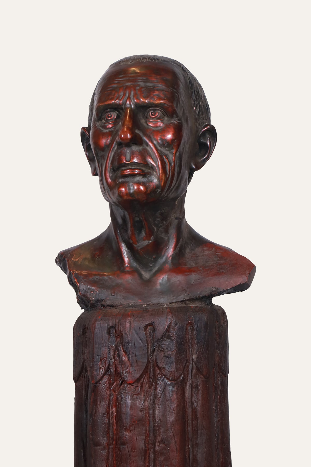 Carved Male Portrait Bust on Tall Faceted Pedestal