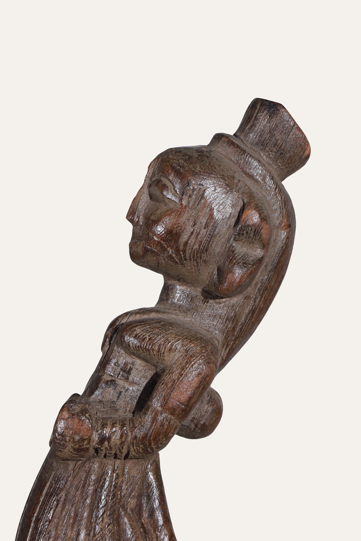 Carved Wooden Indian Folk Doll Figure on Black Stand