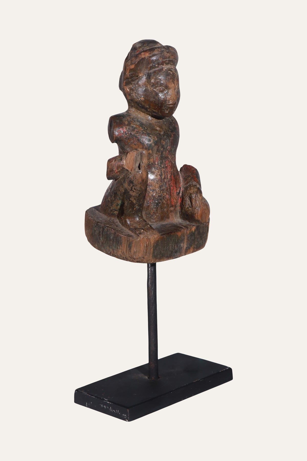 Antique Seated Carved Wooden Folk Figurine on Black Display Stand
