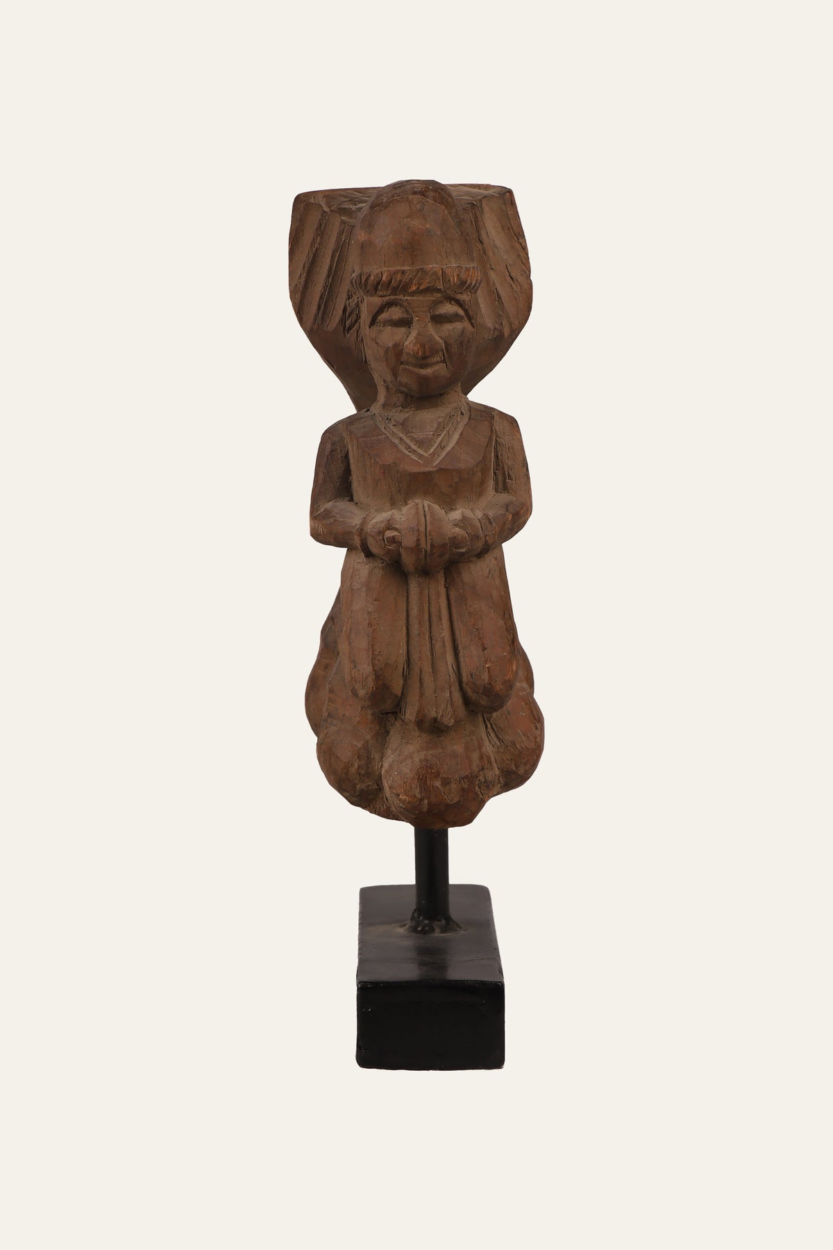 Indian folk musician statue with cymbals