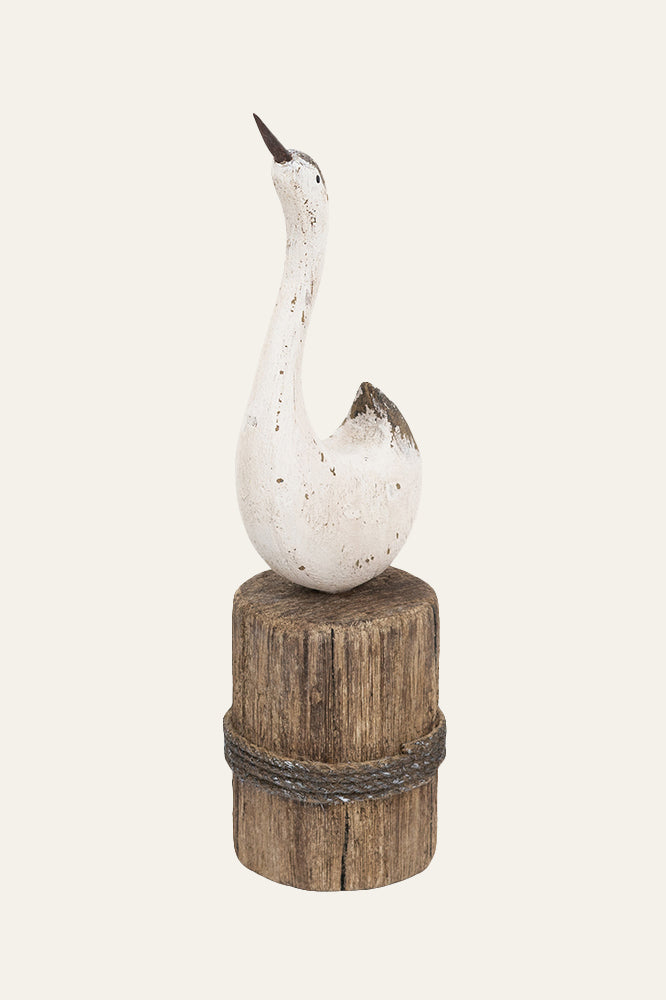 Minimal coastal swan sculpture