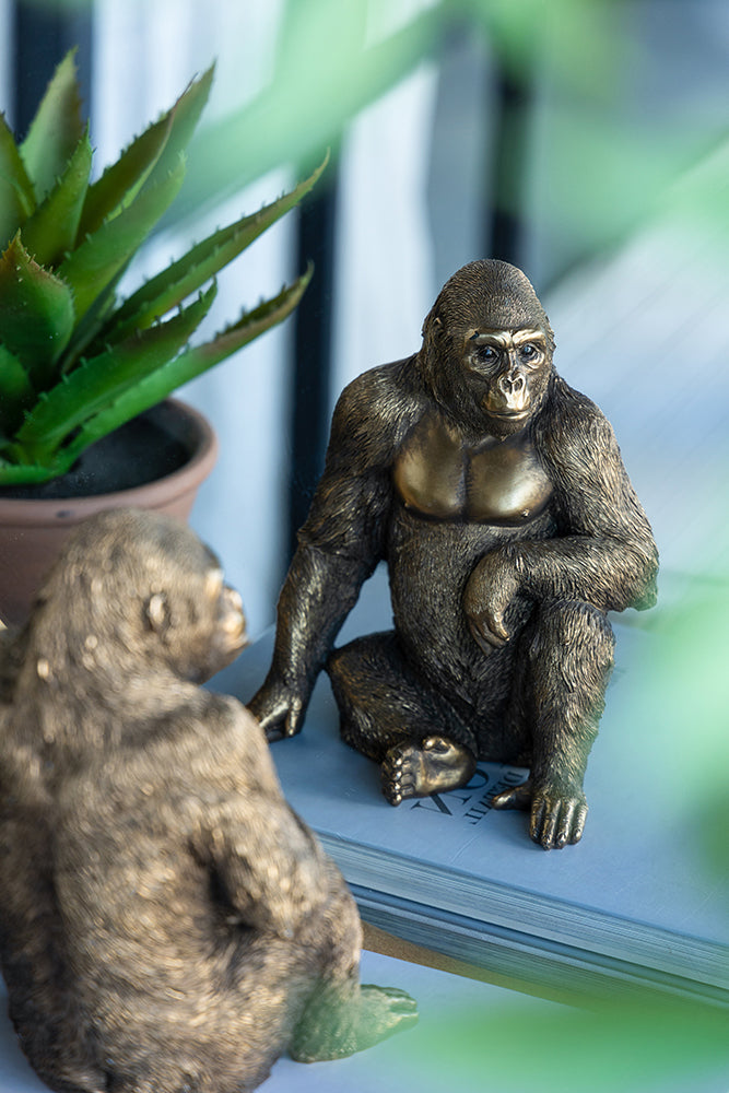 Modern sitting gorilla statue