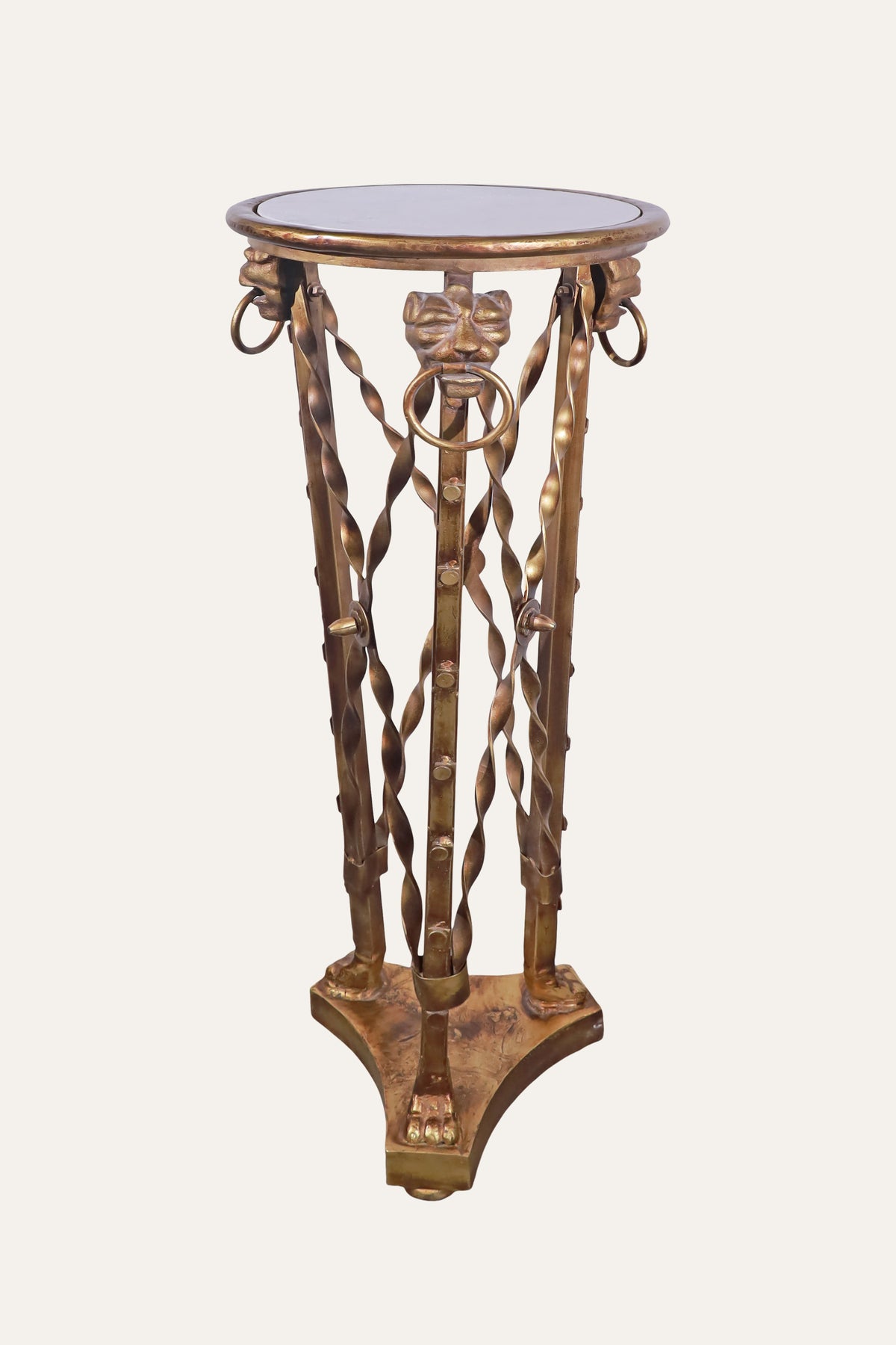 Ornate metal pedestal stand for entryway
