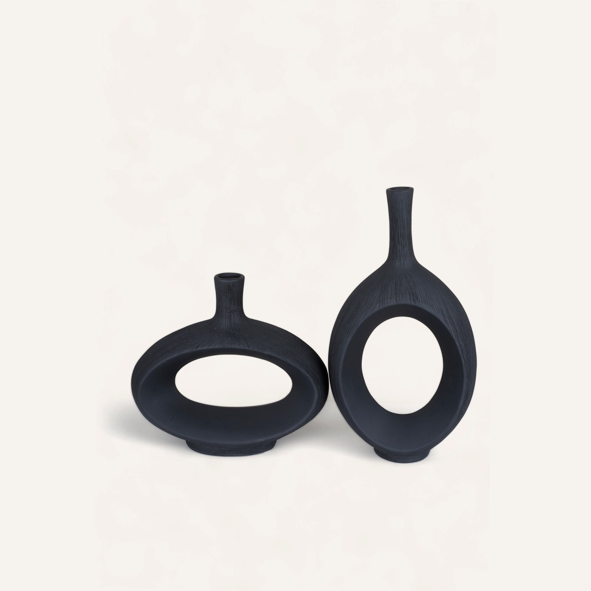Pair of Modern Black Ceramic Vases with Oval Cutouts - main