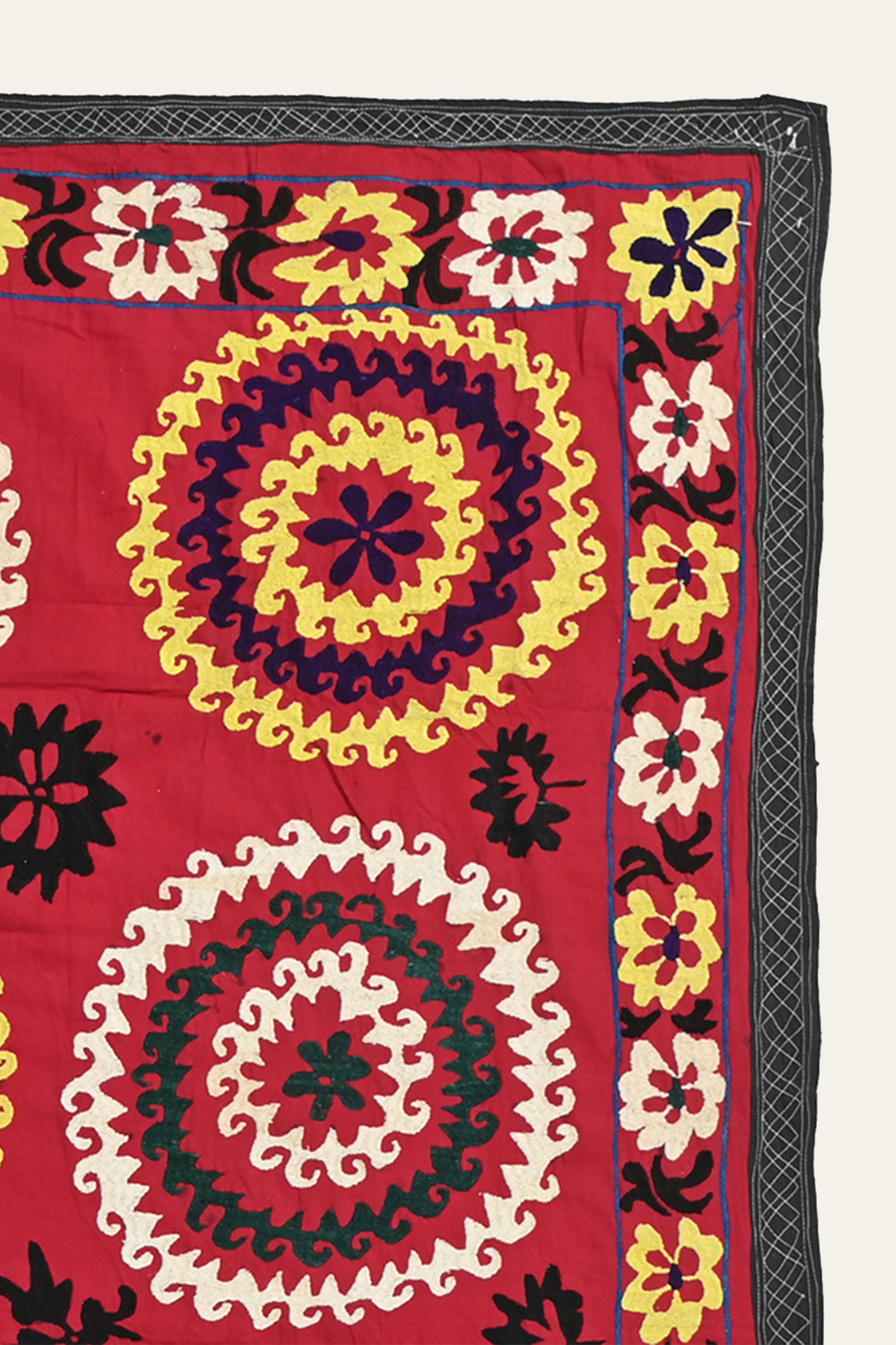 Red Suzani textile art for vintage home decor