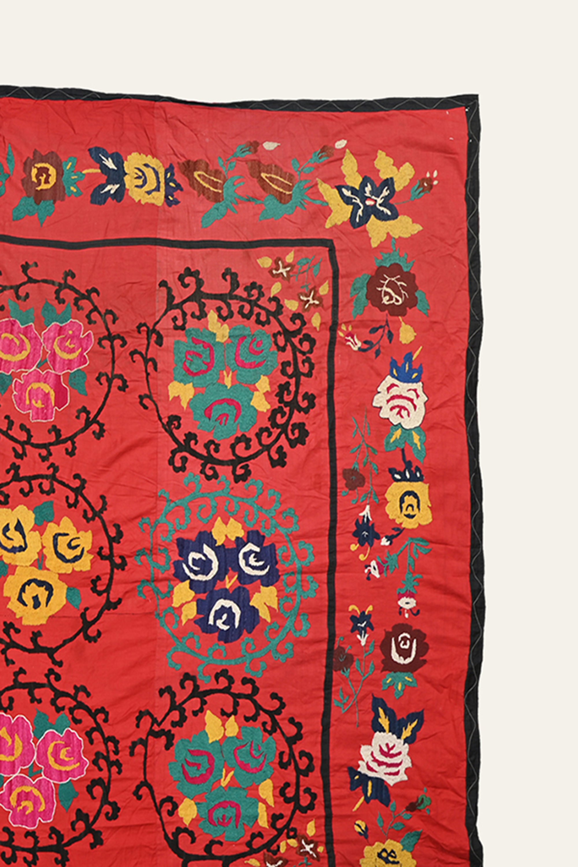 Red Suzani wall hanging