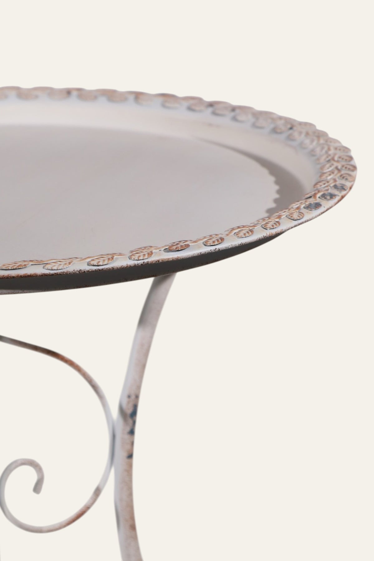 Round distressed metal side table