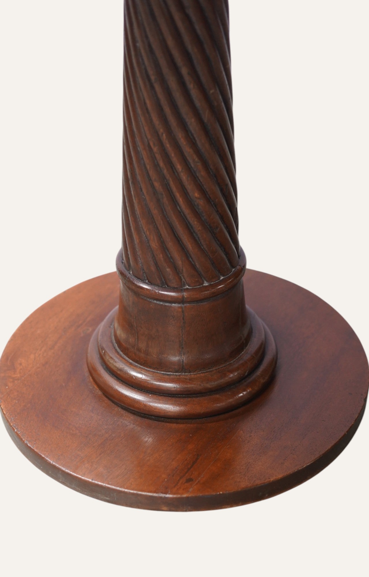 Wooden pedestal with a detailed design 