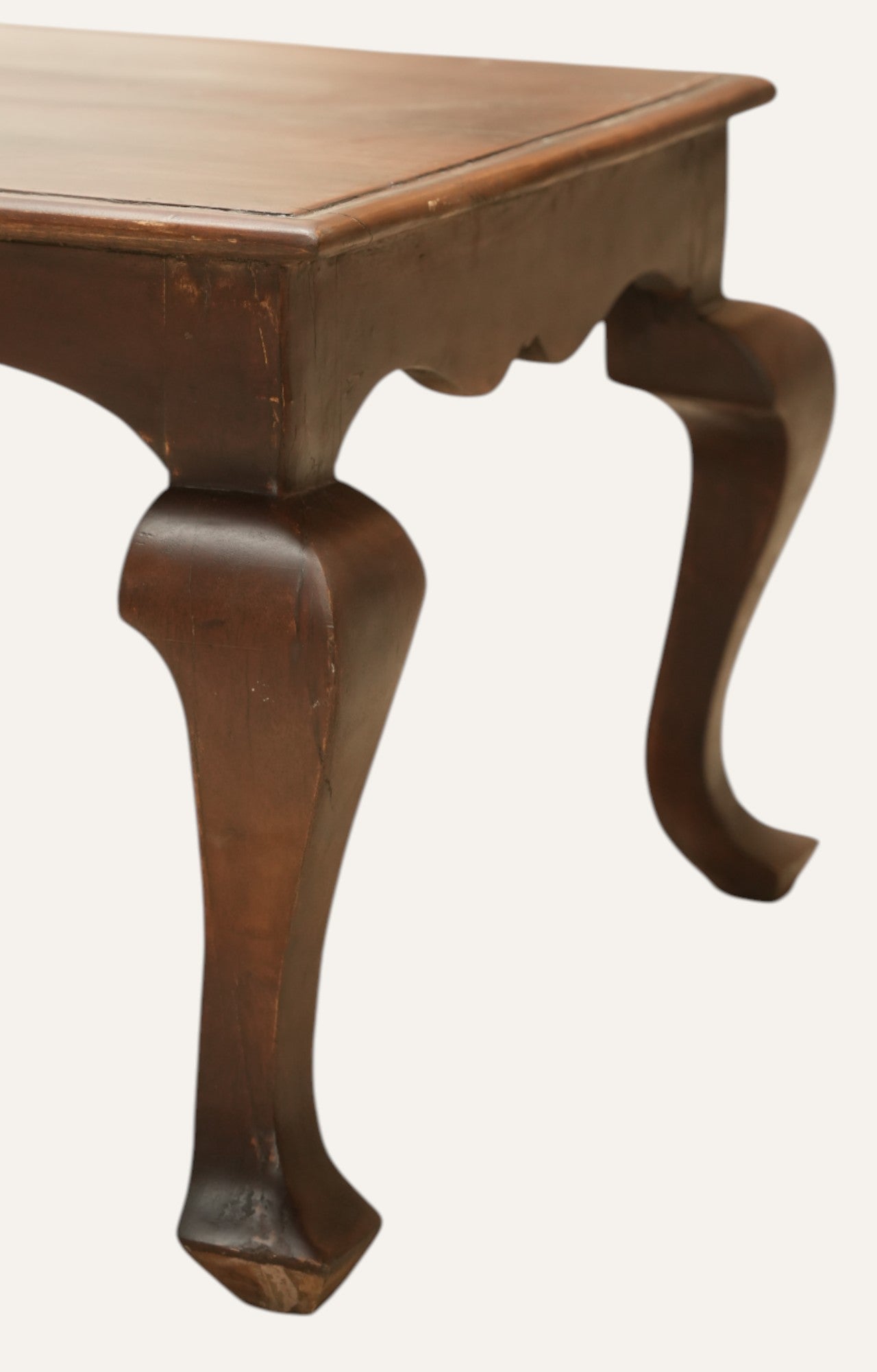 Wooden table with curved legs 