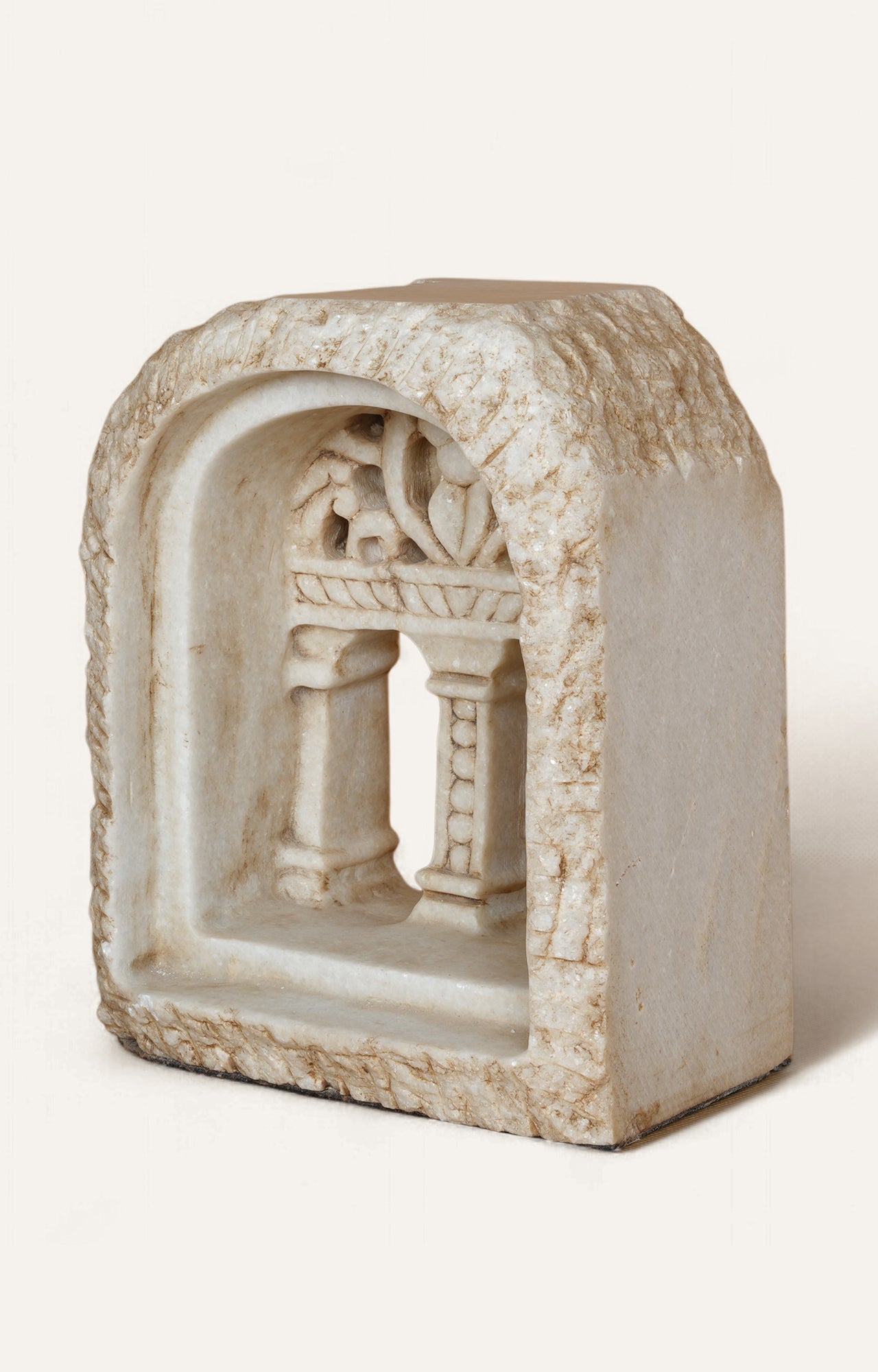 White stone sculpture of a temple