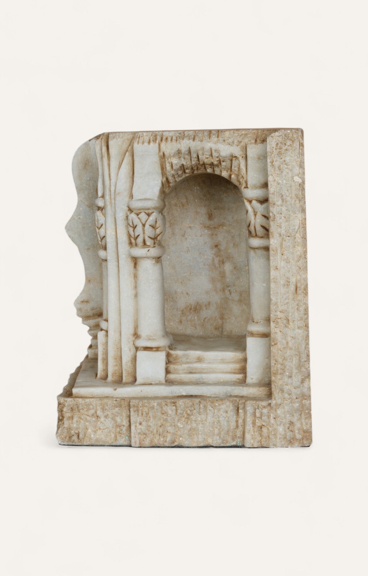 Decorative stone archway sculpture