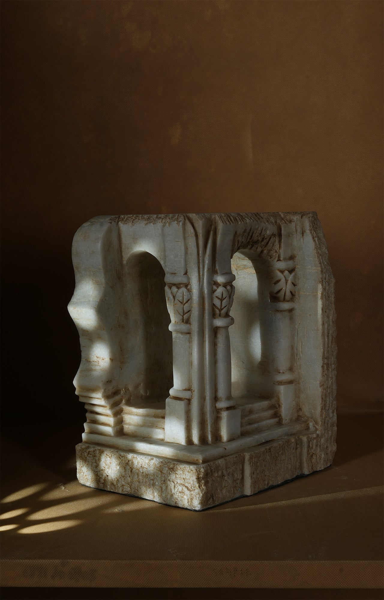 Decorative stone arch sculpture