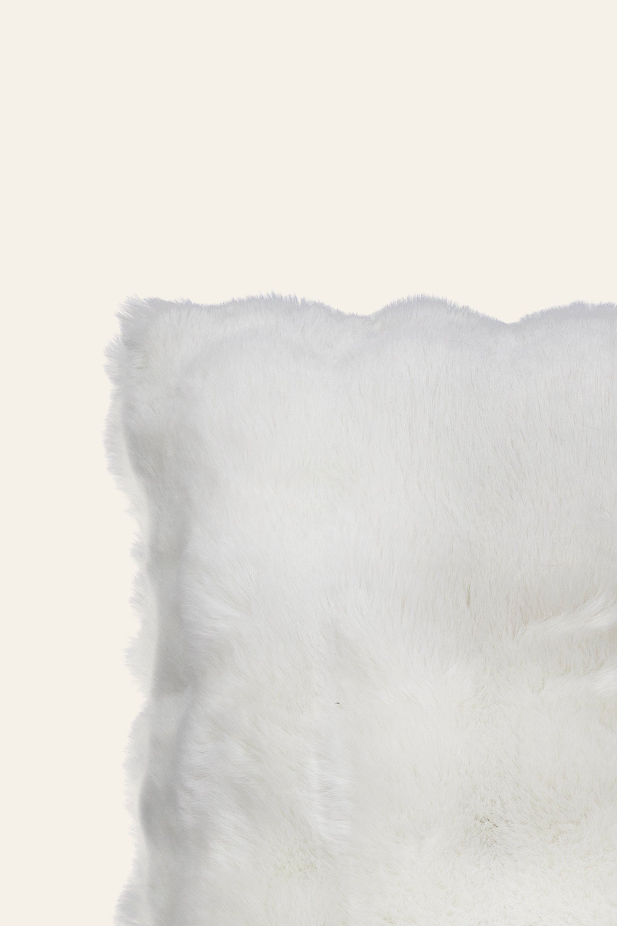 Soft ivory plush throw pillow