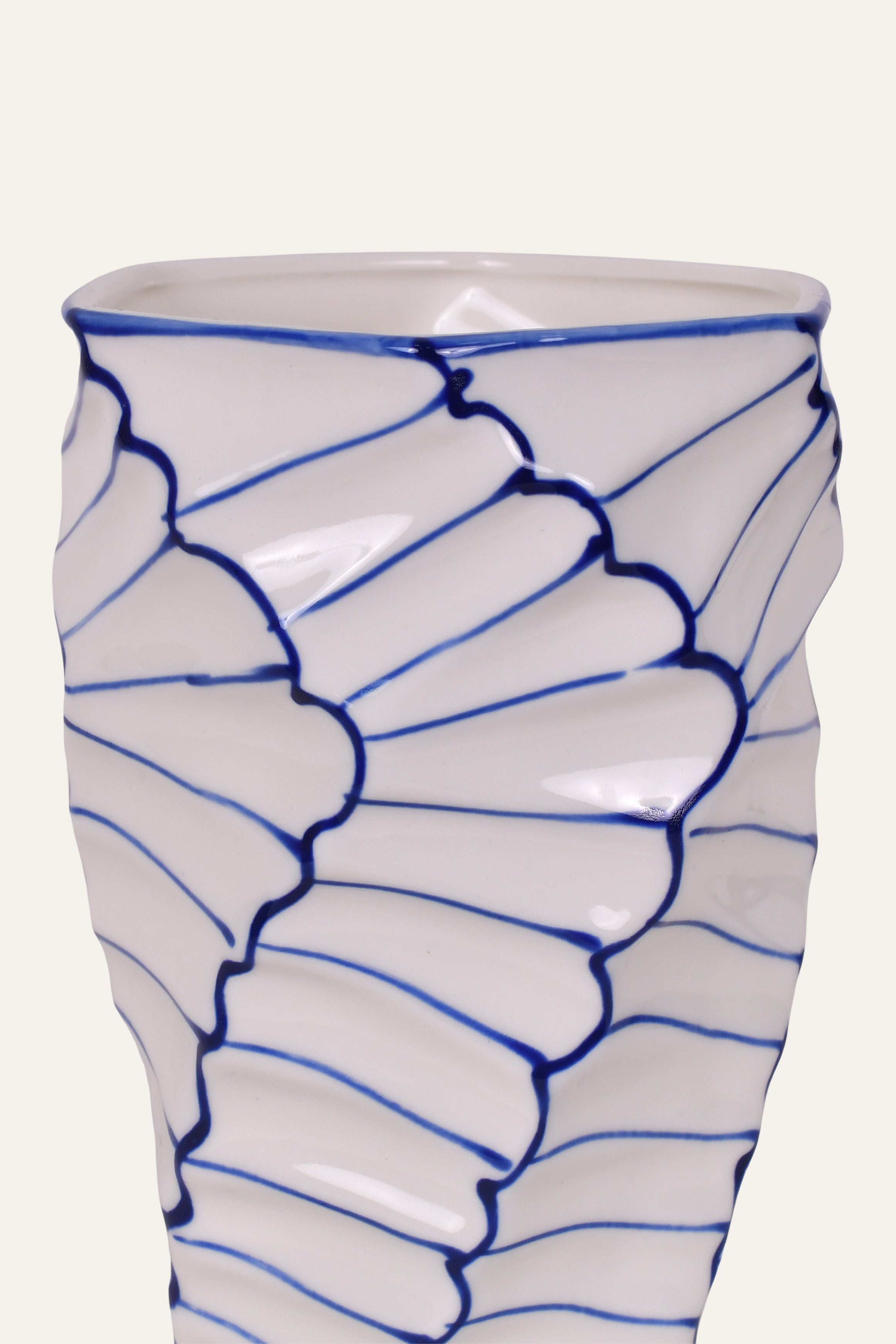 ceramic vase with blue decorative lines 