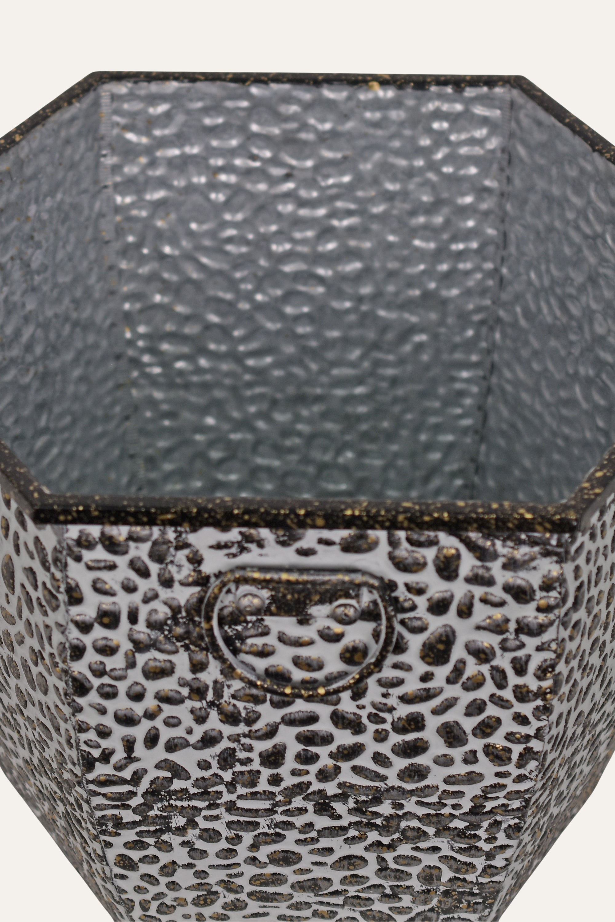 metal planter with textured surface