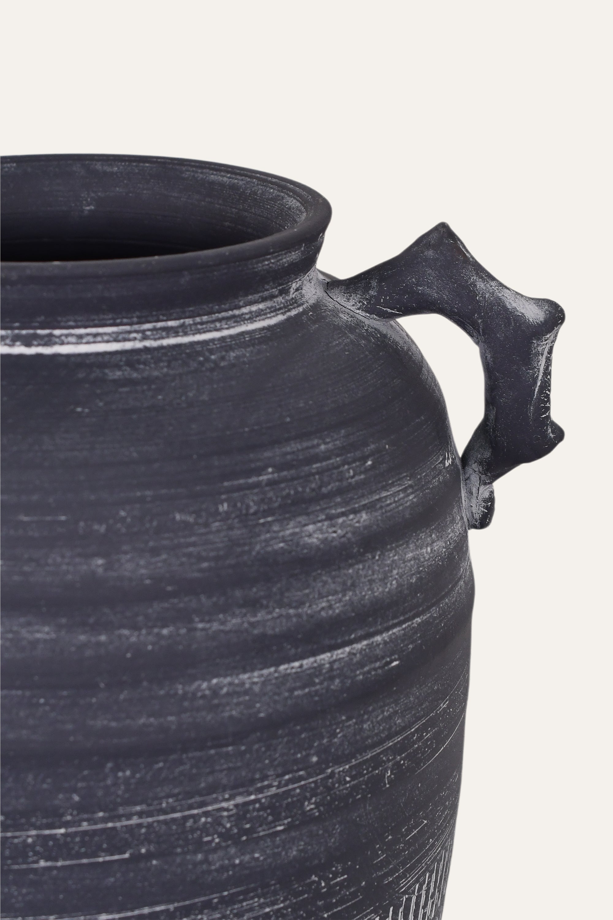 Black ceramic pot with handle