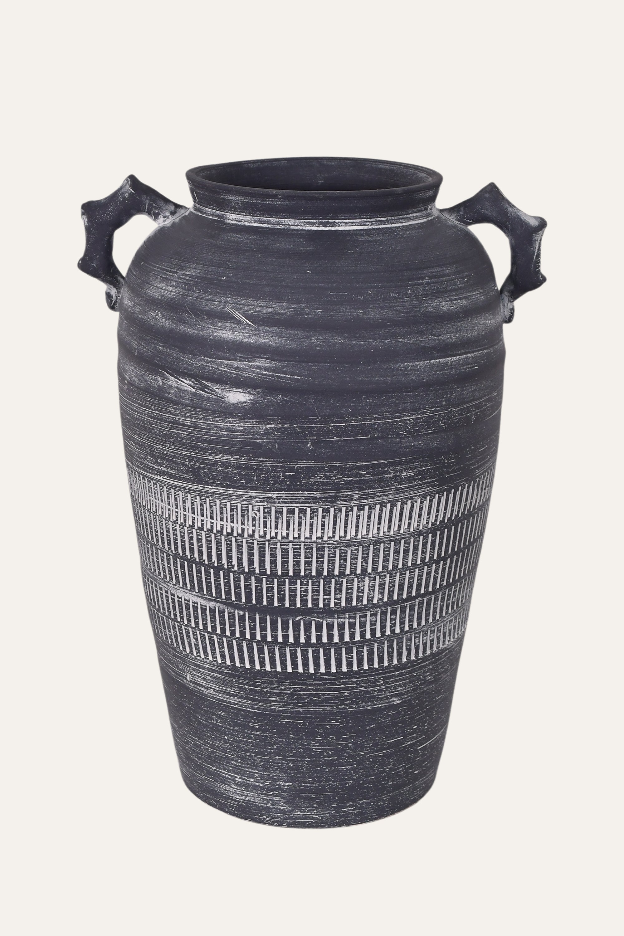 Black textured vase with decorative patterns