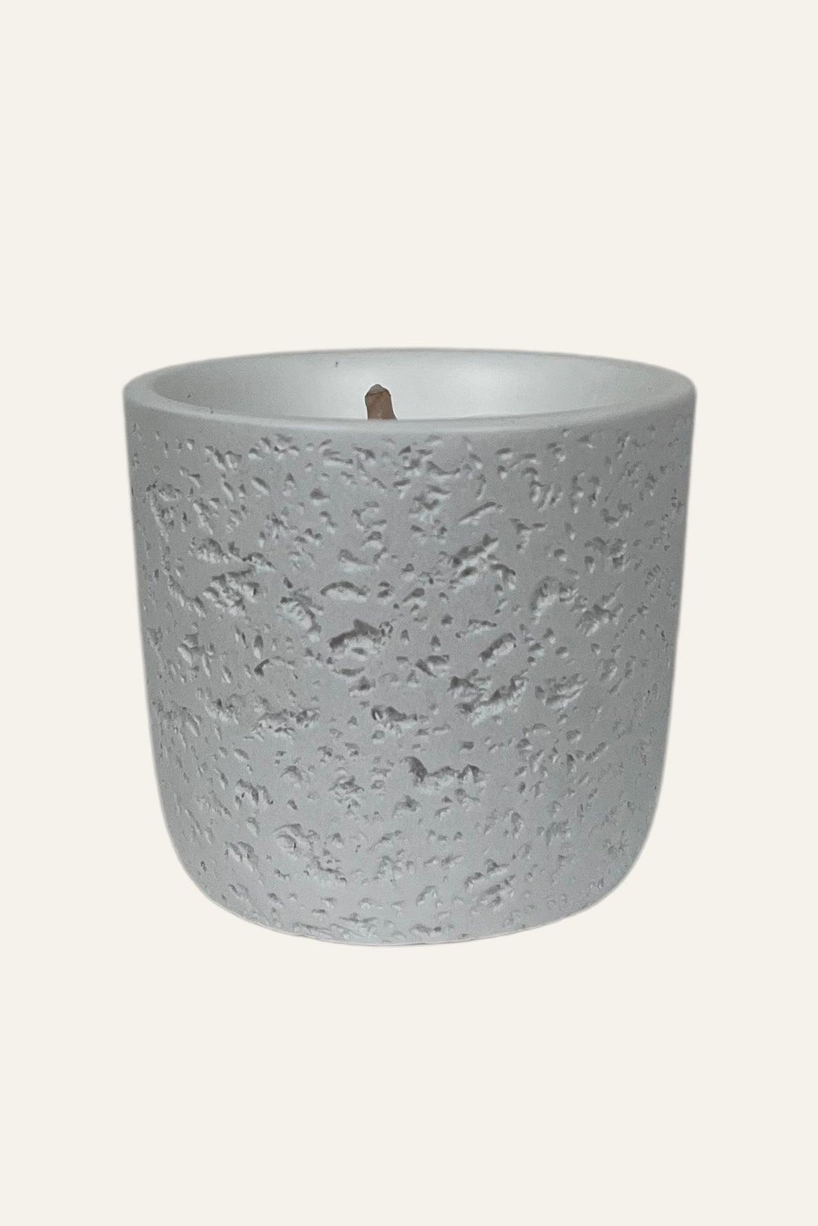 White textured scented candle