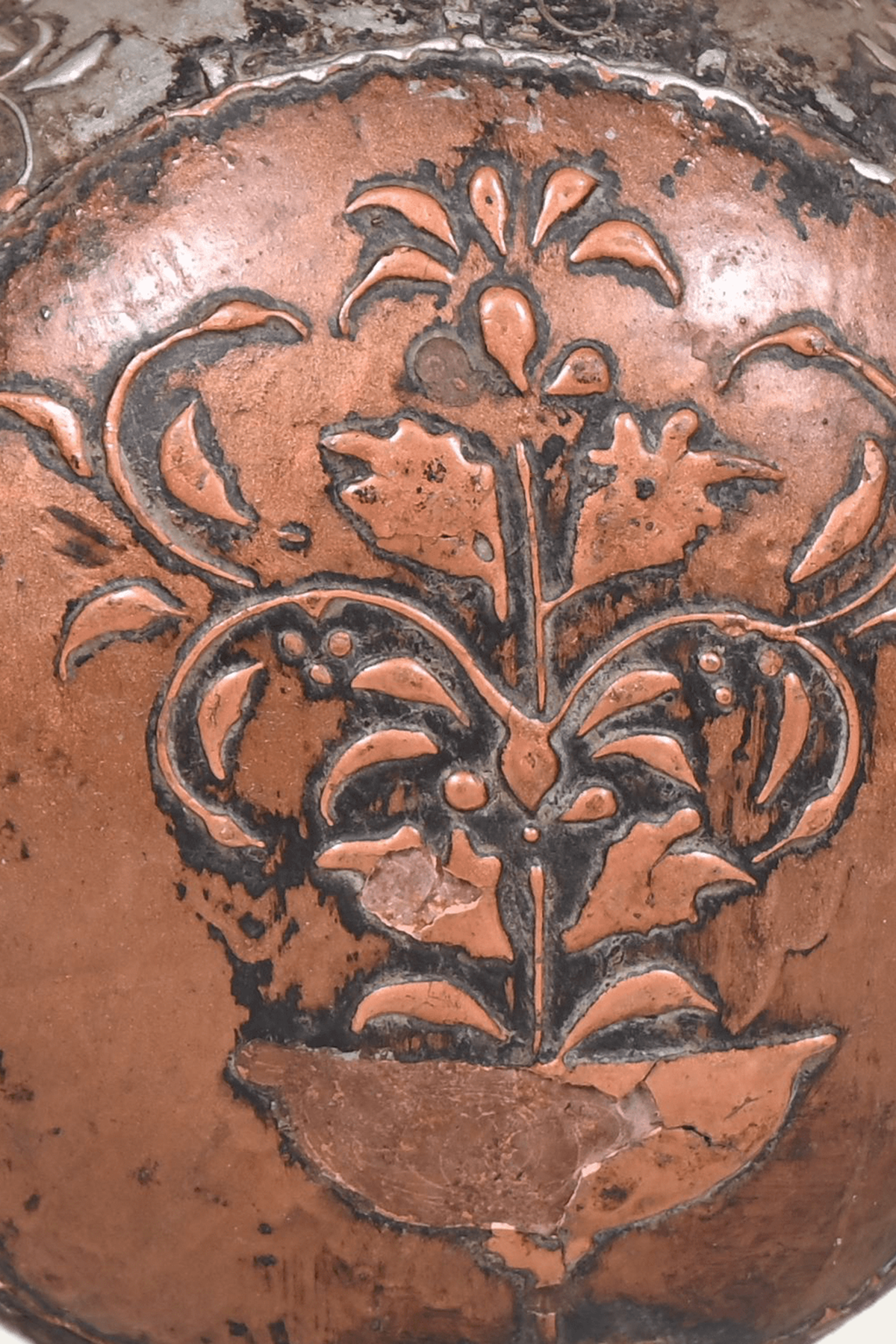 antique metal flask pot with floral medallion
