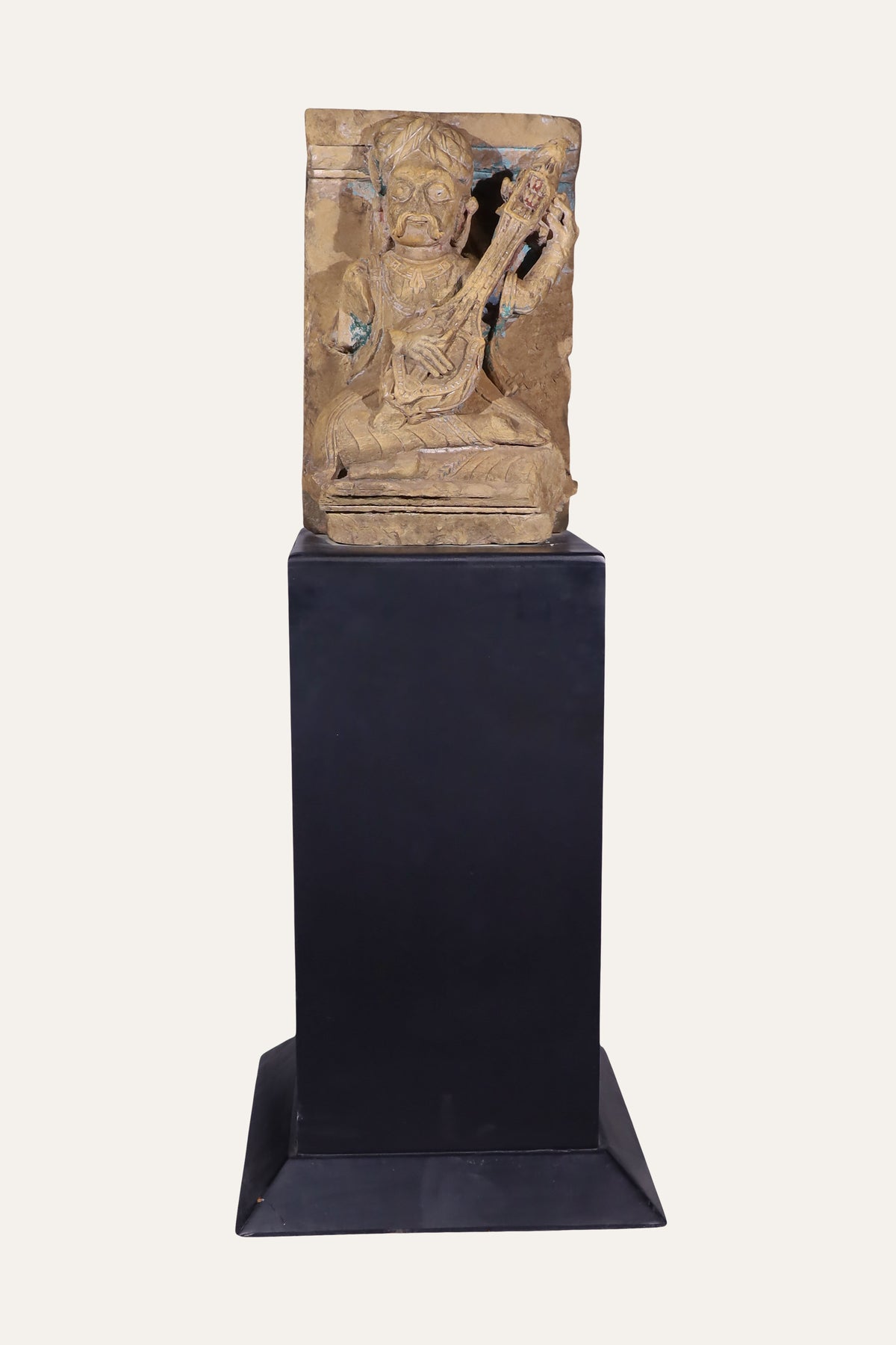 carved court musician relief sculpture