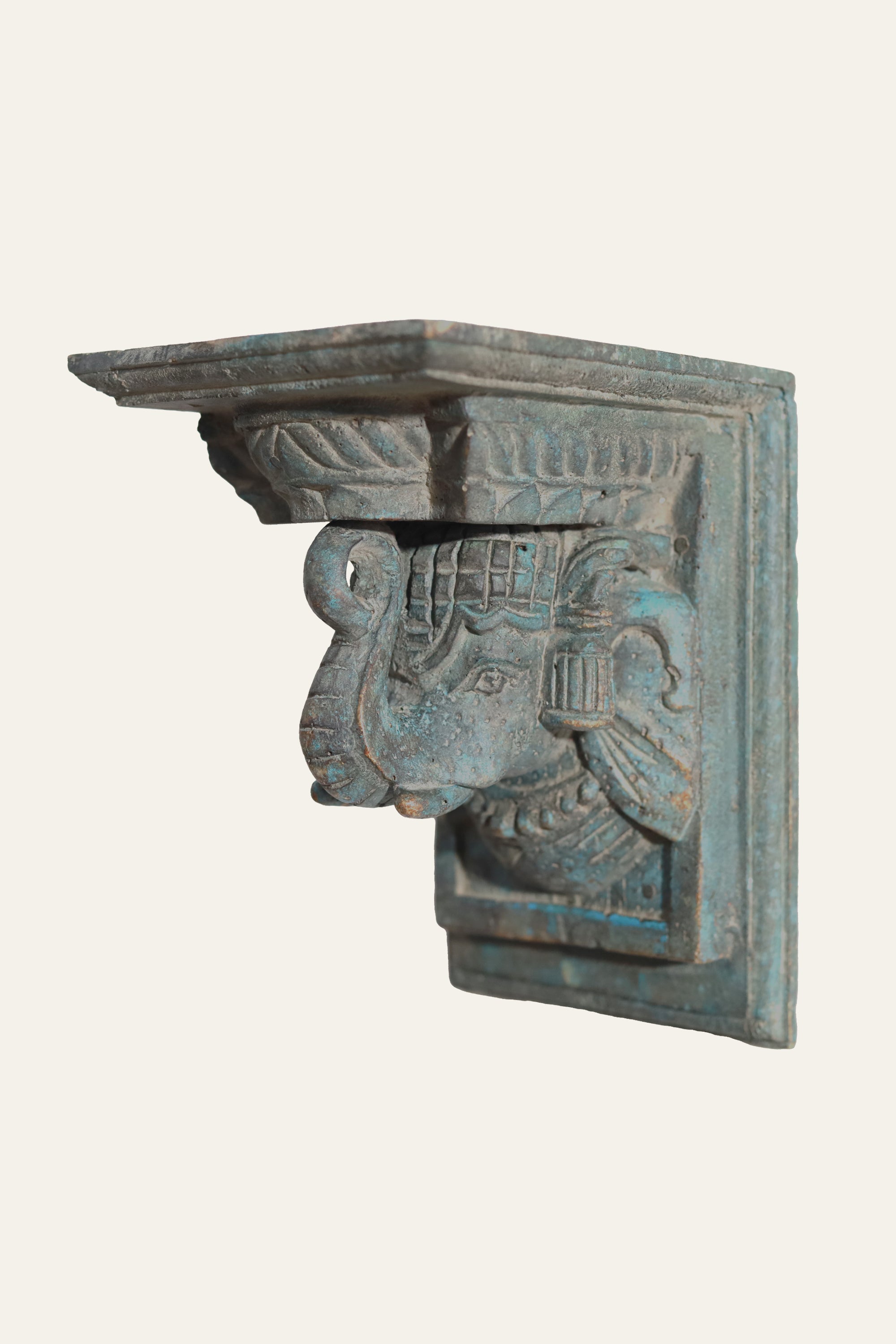 carved elephant motif wooden wall bracket