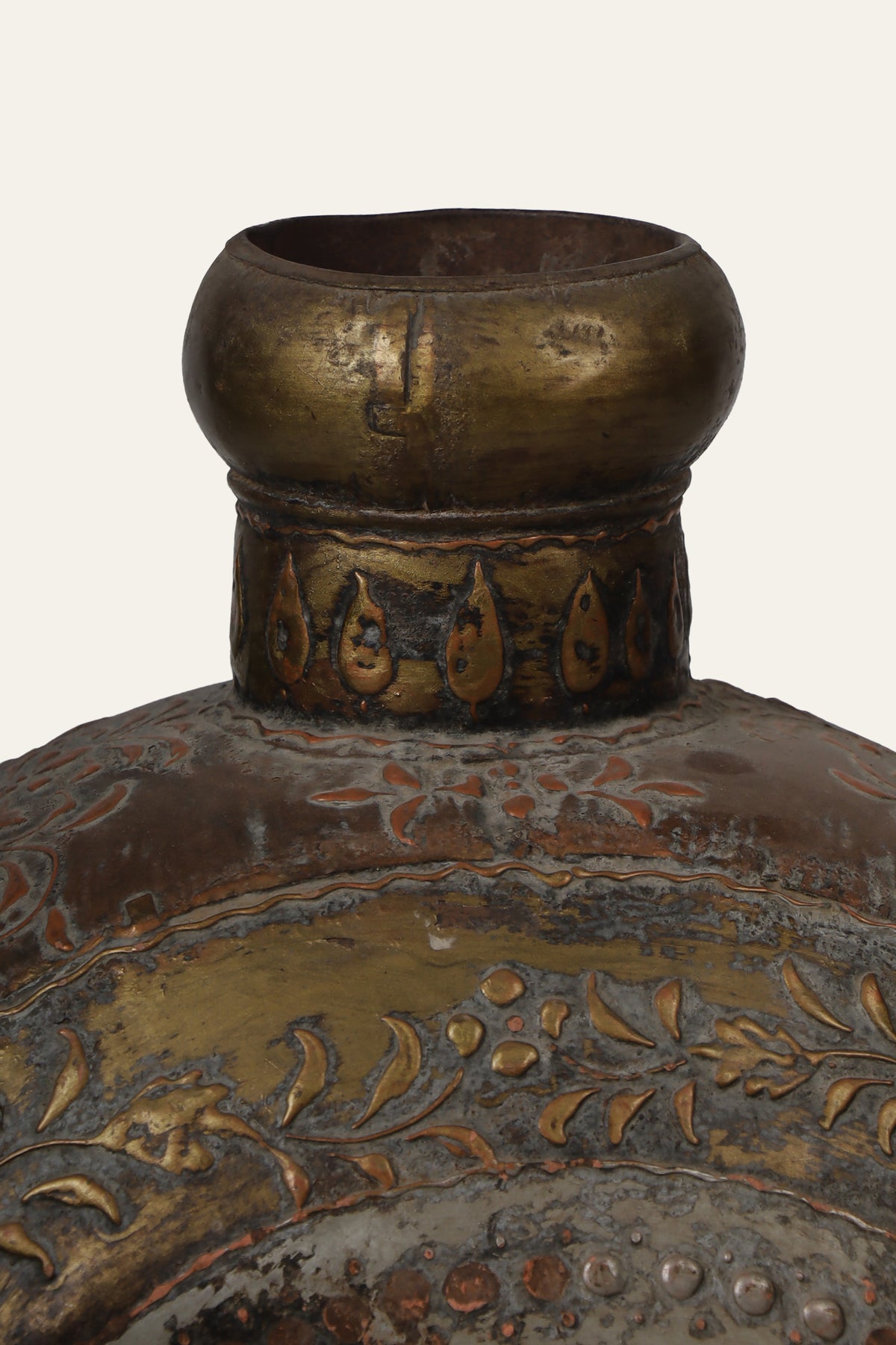 engraved metal flask pot with botanical design