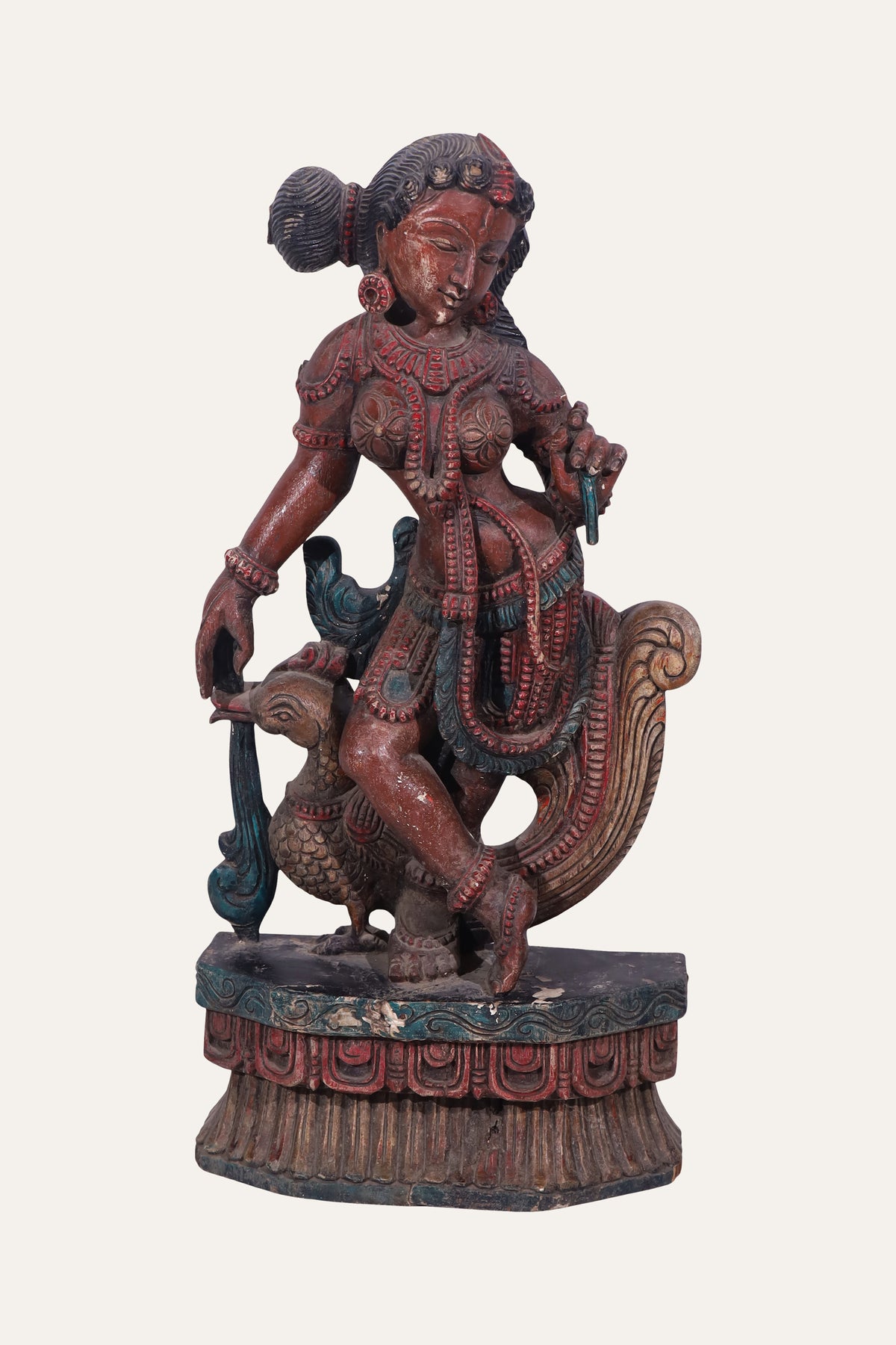hand-painted wooden Apsara figurine with peacock