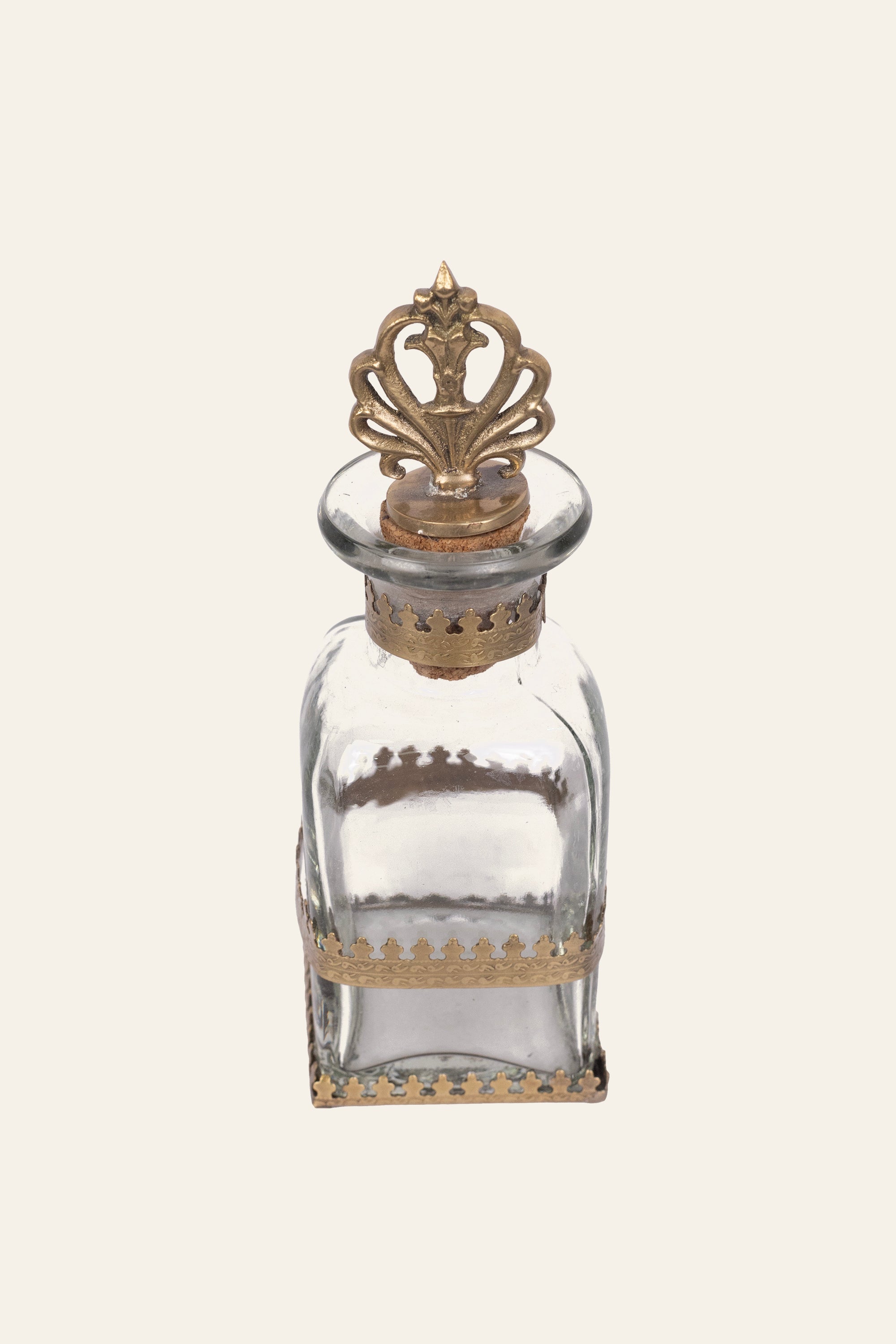 luxury glass bottle with brass top