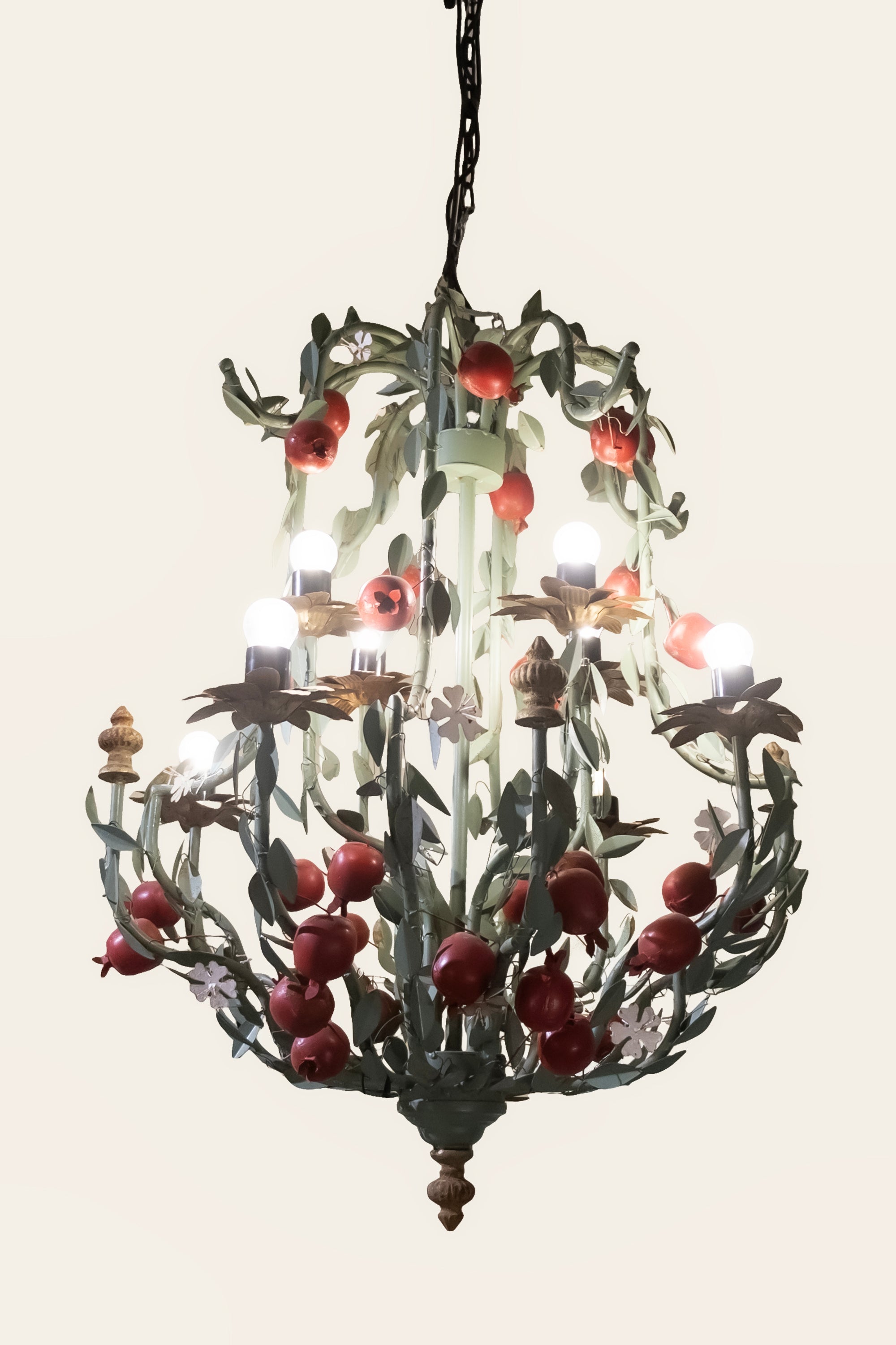 metal chandelier with leafy scrollwork