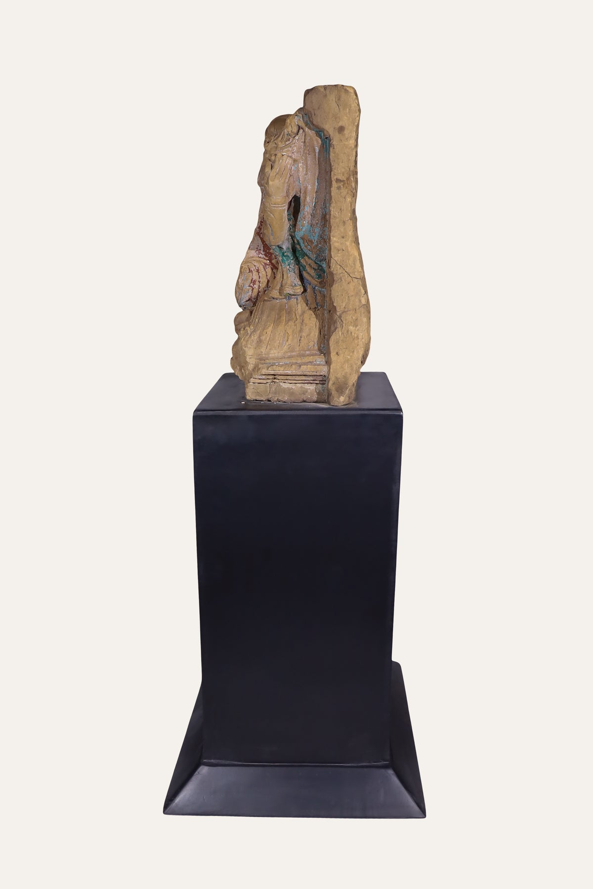 relief sculpture on plinth