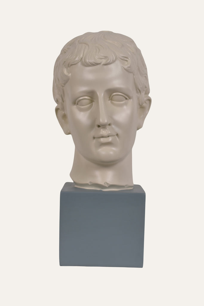 resin Roman head bust on pedestal 