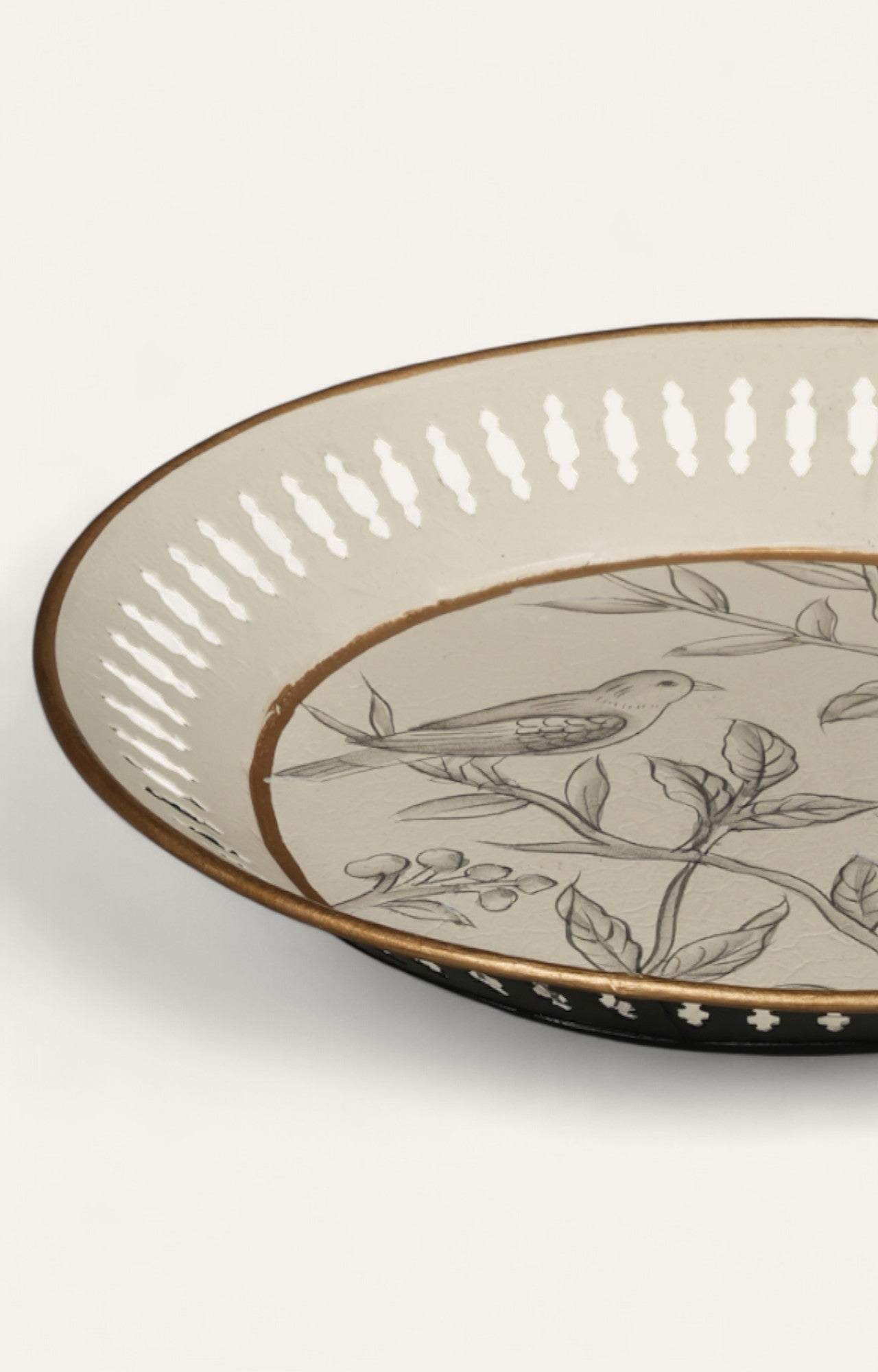 round metal tray with bird design