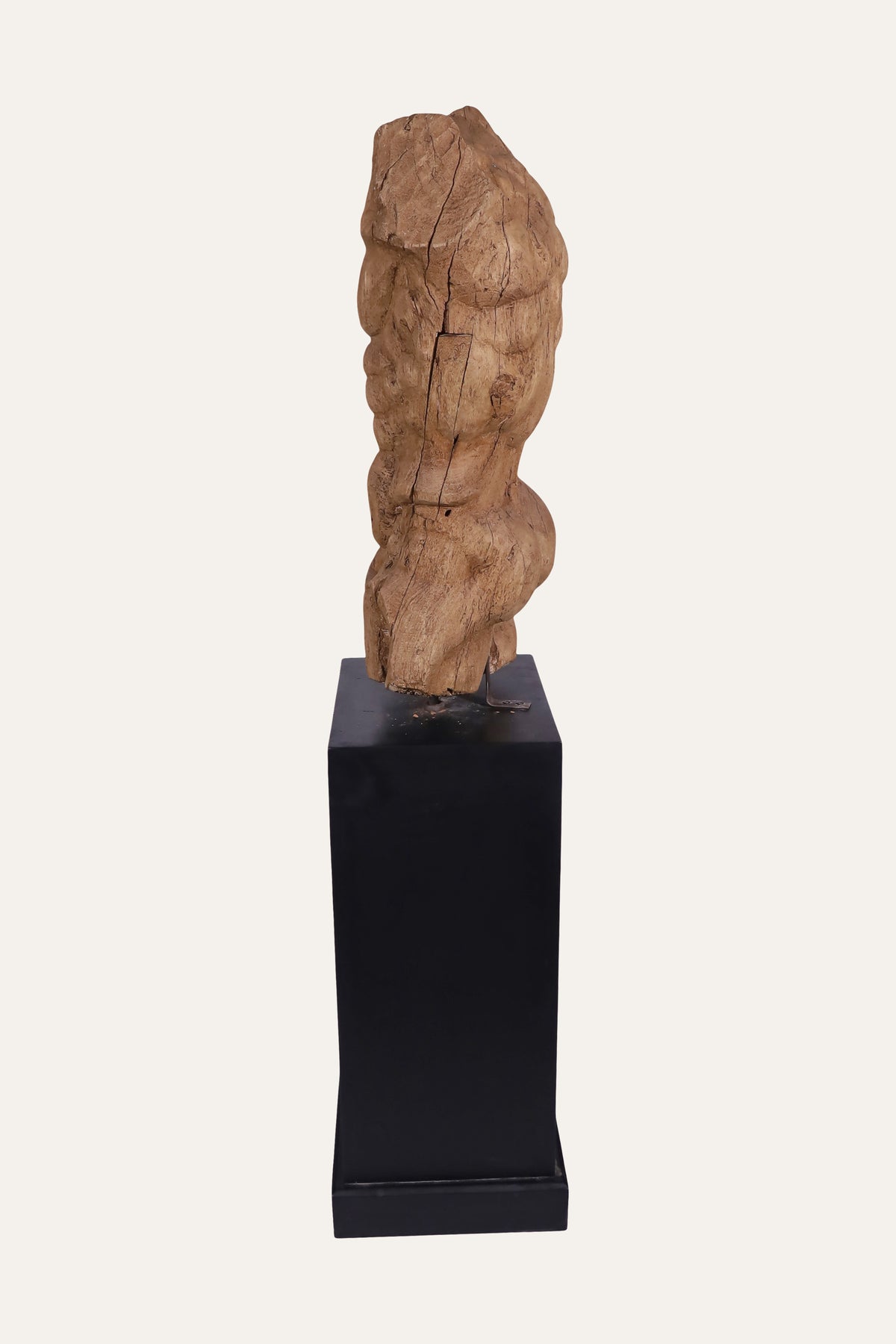 torso sculpture on plinth