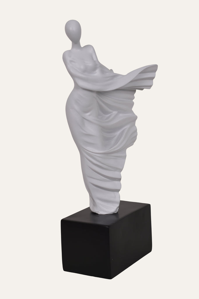 white resin abstract dancer sculpture